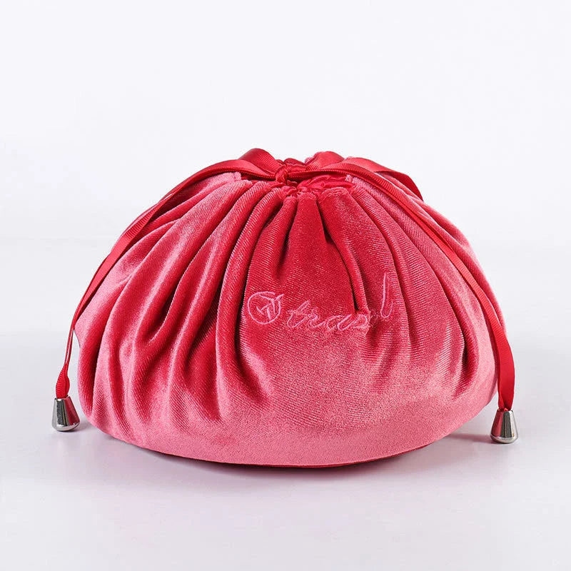 Adorable rabbit ear velvet cosmetic bags in various colors for storing and organizing makeup, toiletries, and other beauty essentials.