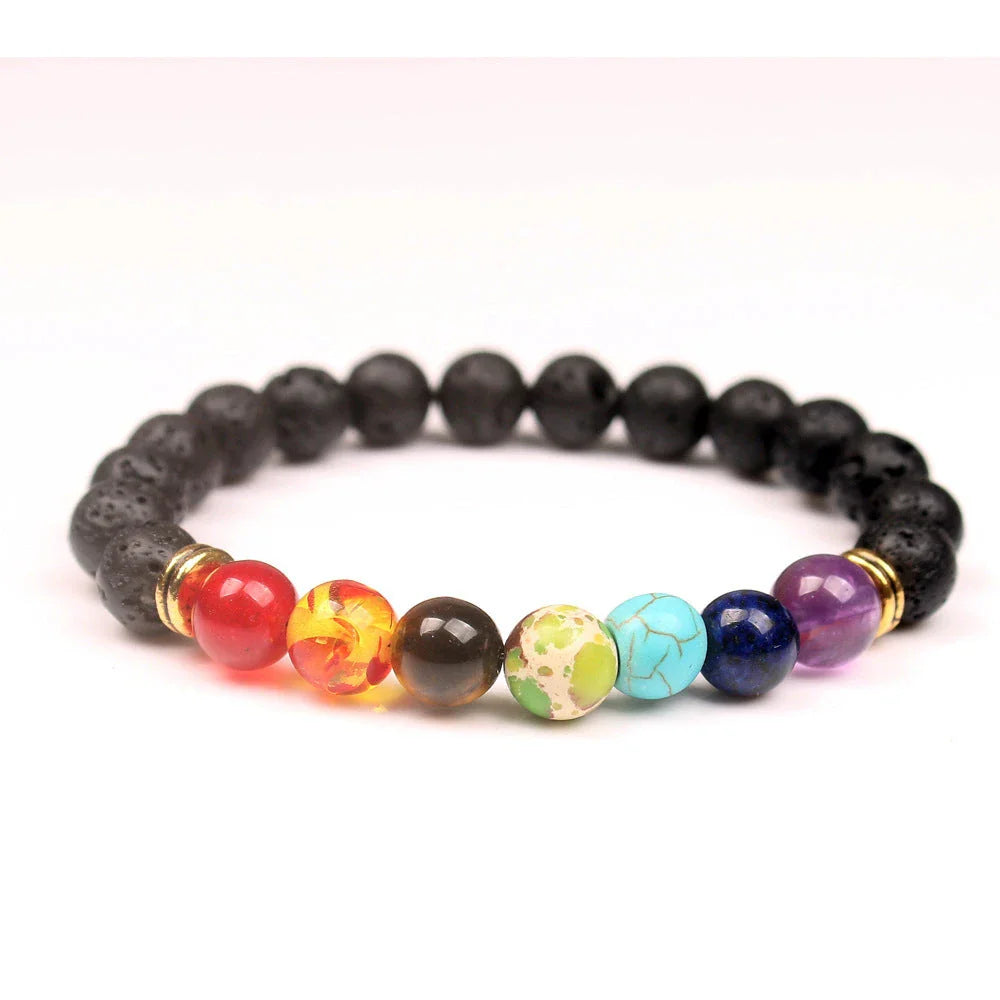 Handcrafted beaded bracelet with seven chakra-representing beads, designed to promote balance and well-being.