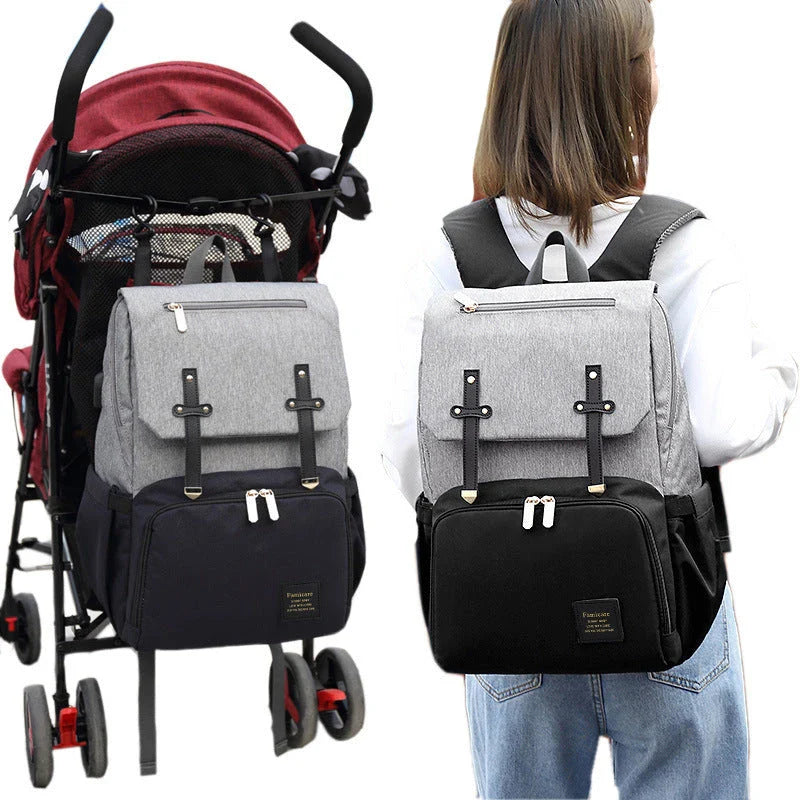 Stylish and functional diaper backpack with large capacity, stroller hooks, and USB charging port for modern parents