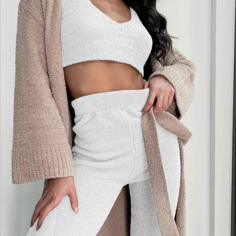 A cozy 3-piece loungewear set featuring a long sleeve crop top and drawstring shorts in a variety of stylish colors.