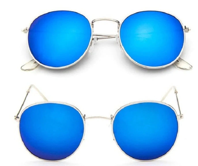 Stylish retro sunglasses for women with metal frame and glass lenses