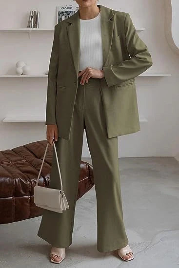 Tailored ladies' suit in various colours, featuring a jacket and trousers made of premium polyester fabric.