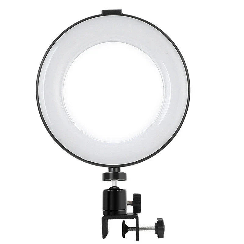 Compact clip-on studio lighting for video conferencing with circular design and adjustable swivel