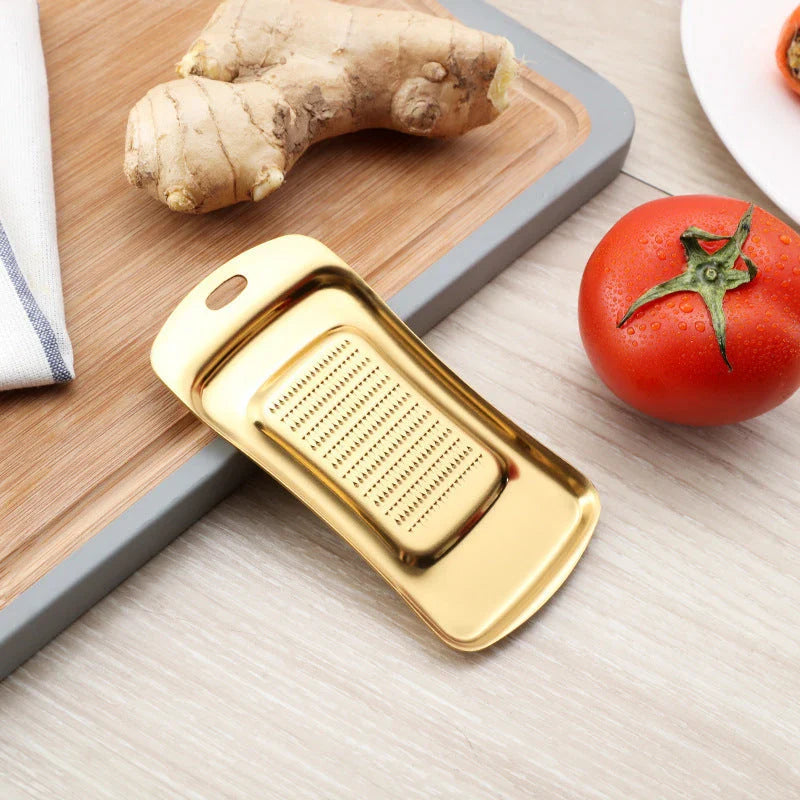 Premium Stainless Steel Grate and Shave Tool for Effortlessly Grating, Shredding, and Slicing Garlic, Ginger, Cheese, Fruits, and Vegetables