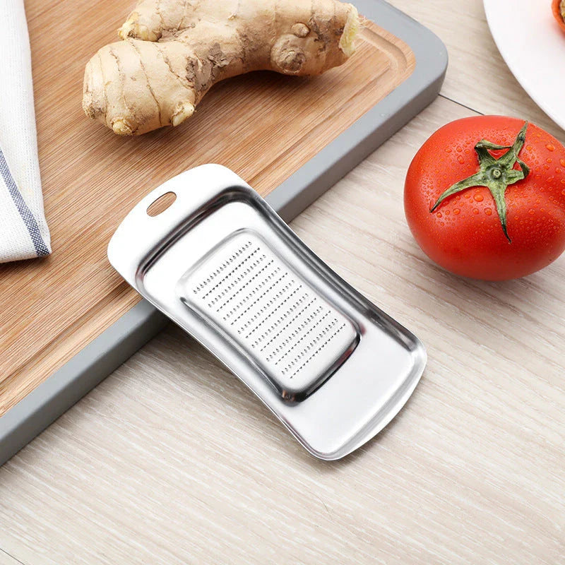 Premium Stainless Steel Grate and Shave Tool for Effortlessly Grating, Shredding, and Slicing Garlic, Ginger, Cheese, Fruits, and Vegetables