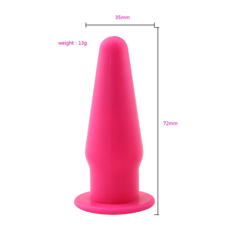 Premium silicone vibrating anal plug for G-spot stimulation in rose red, black, or purple.