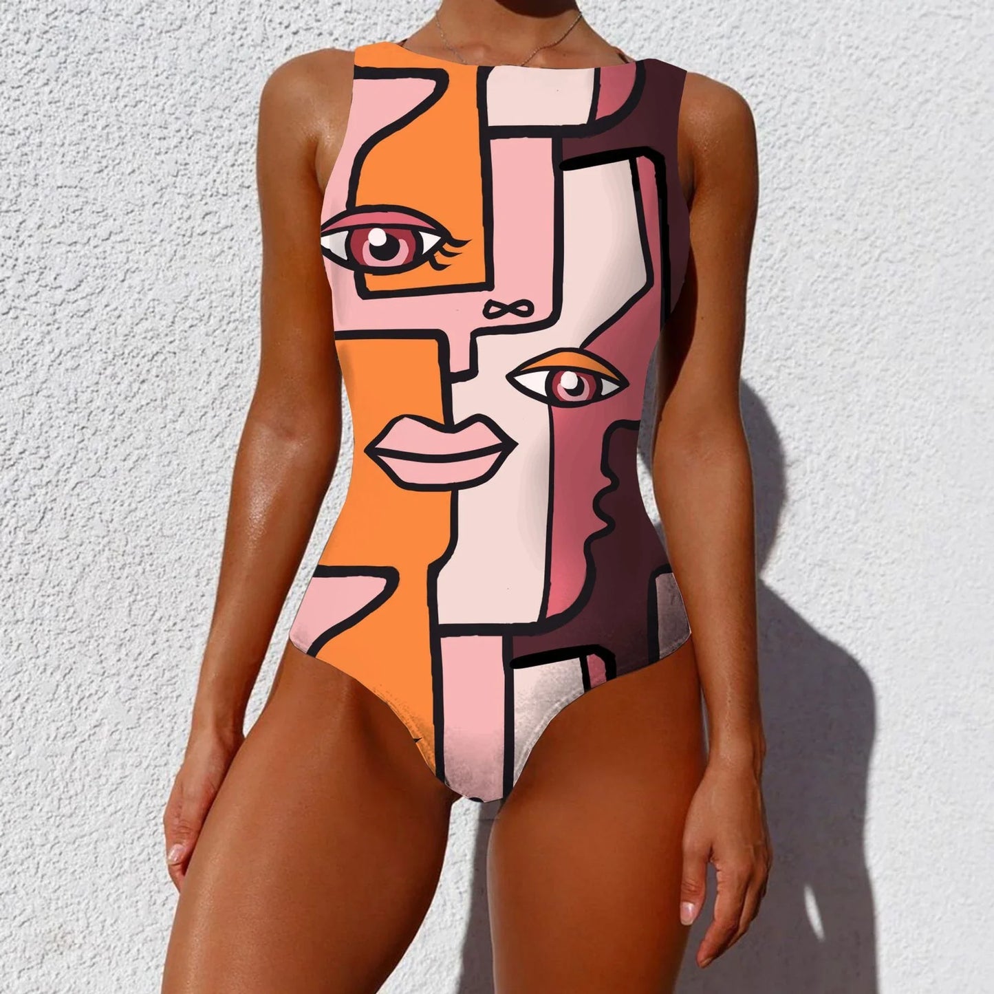 Stylish one-piece swimsuit featuring a vintage-inspired abstract print design for a bold, fashionable look