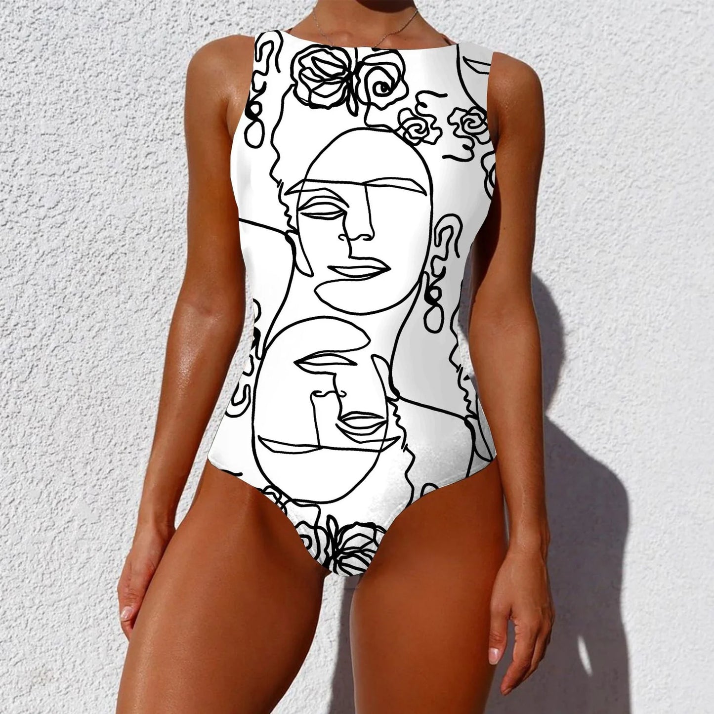 Stylish one-piece swimsuit featuring a vintage-inspired abstract print design for a bold, fashionable look