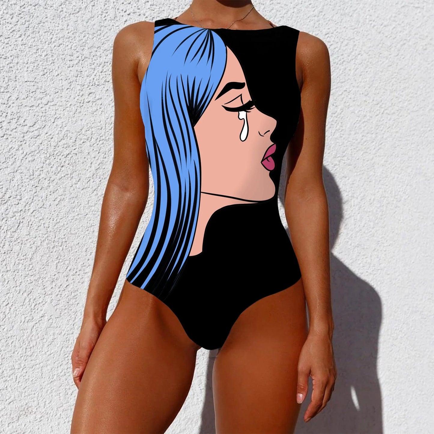 Stylish one-piece swimsuit featuring a vintage-inspired abstract print design for a bold, fashionable look