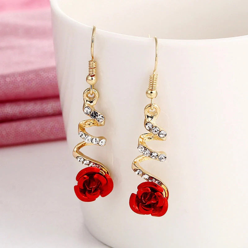 Elegant rose blossom earrings featuring delicate floral designs and tassel accents in a variety of styles