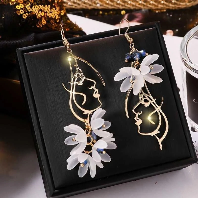 Elegant rose blossom earrings featuring delicate floral designs and tassel accents in a variety of styles