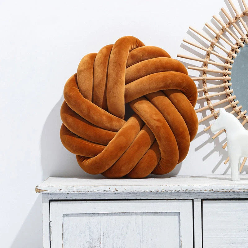 Plush decorative throw pillows with knotted ball design in various colors for living room, bedroom, and photography