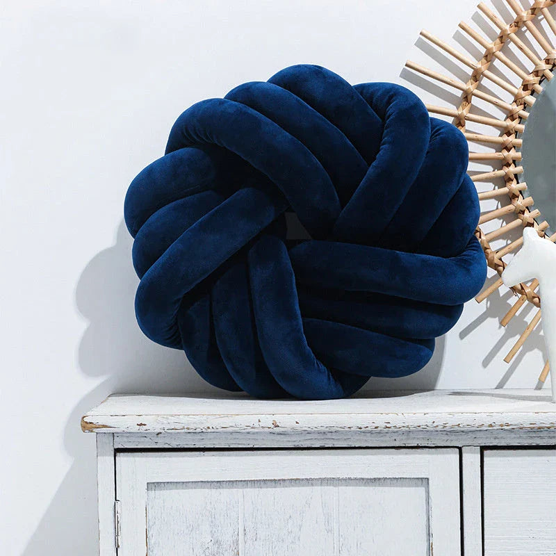 Plush decorative throw pillows with knotted ball design in various colors for living room, bedroom, and photography
