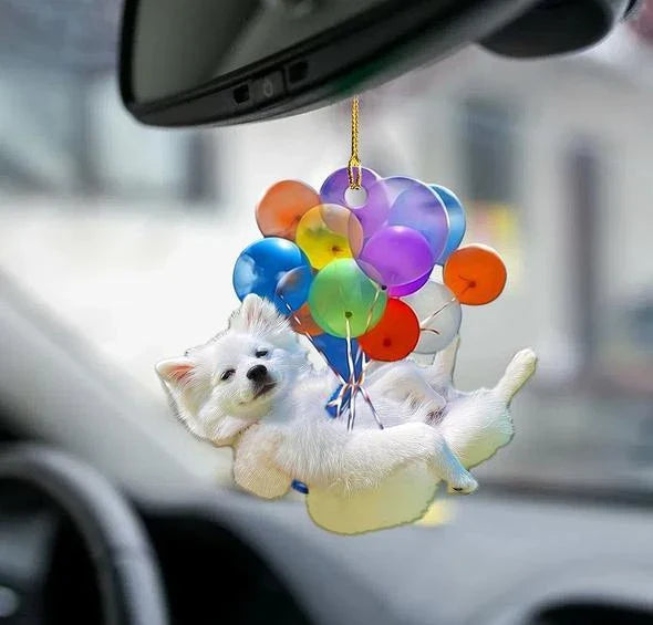 Charming dog-shaped car decoration with vibrant parachute accent, made of durable acrylic for versatile use.