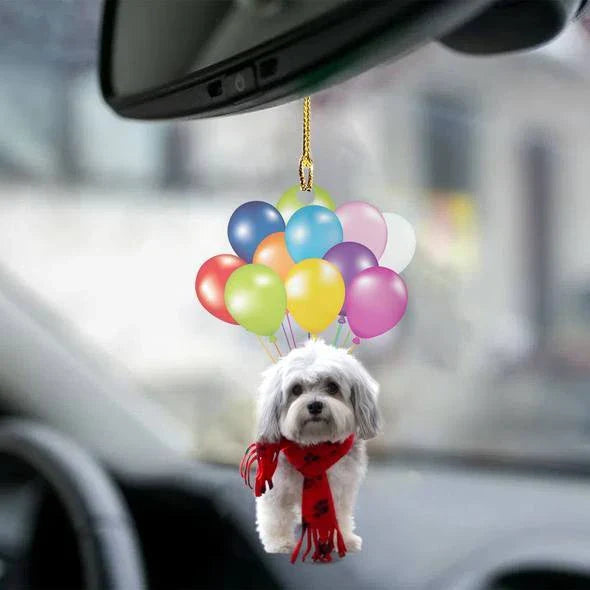 Charming dog-shaped car decoration with vibrant parachute accent, made of durable acrylic for versatile use.