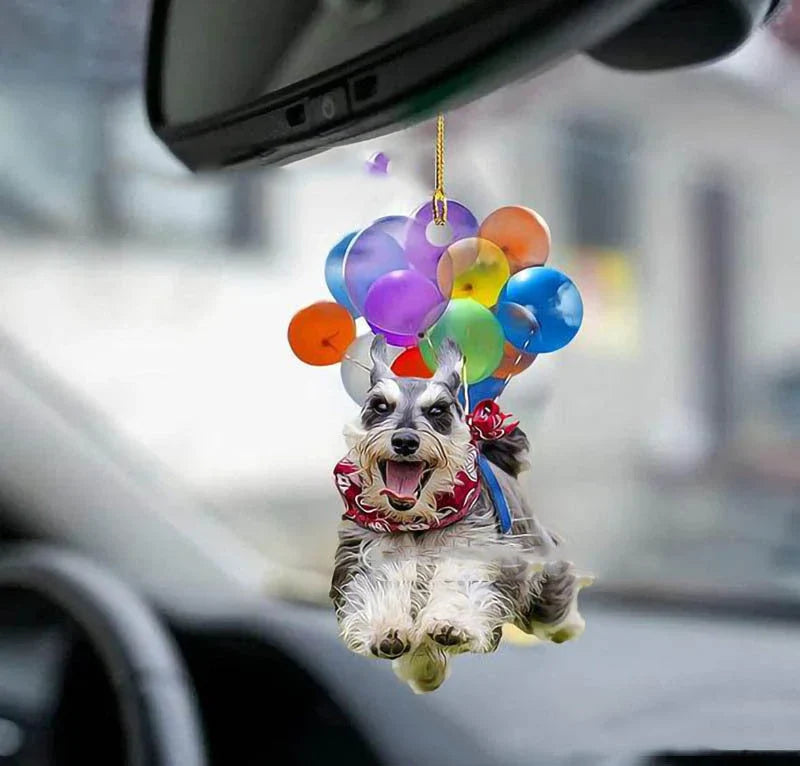 Charming dog-shaped car decoration with vibrant parachute accent, made of durable acrylic for versatile use.