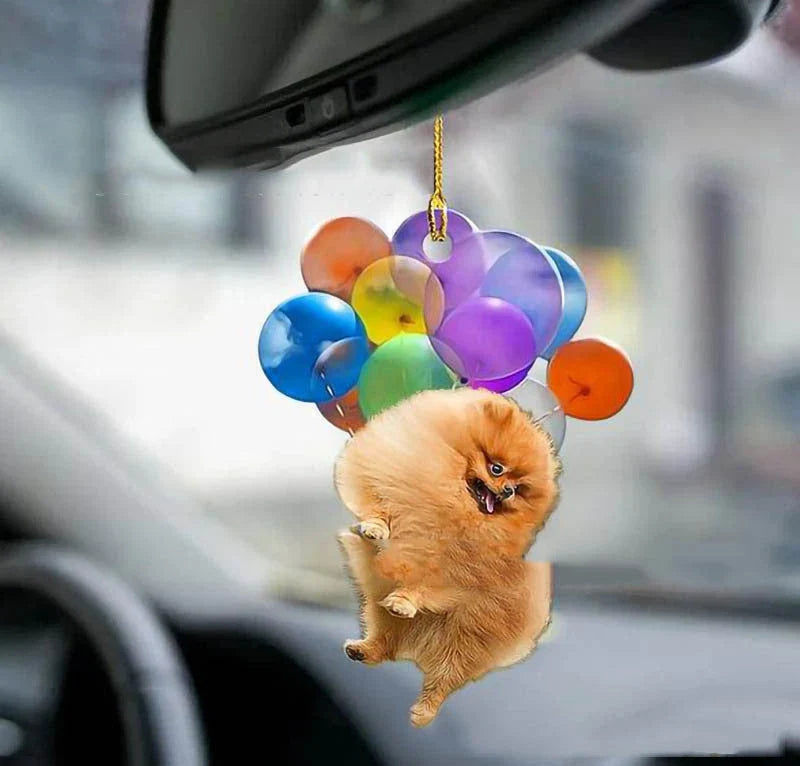 Charming dog-shaped car decoration with vibrant parachute accent, made of durable acrylic for versatile use.