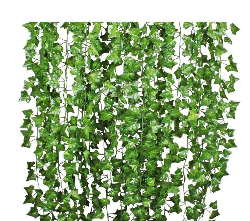 Premium silk hanging leaf garland with realistic green leaves and flexible rattan vine for customizable home, wedding, and garden decor