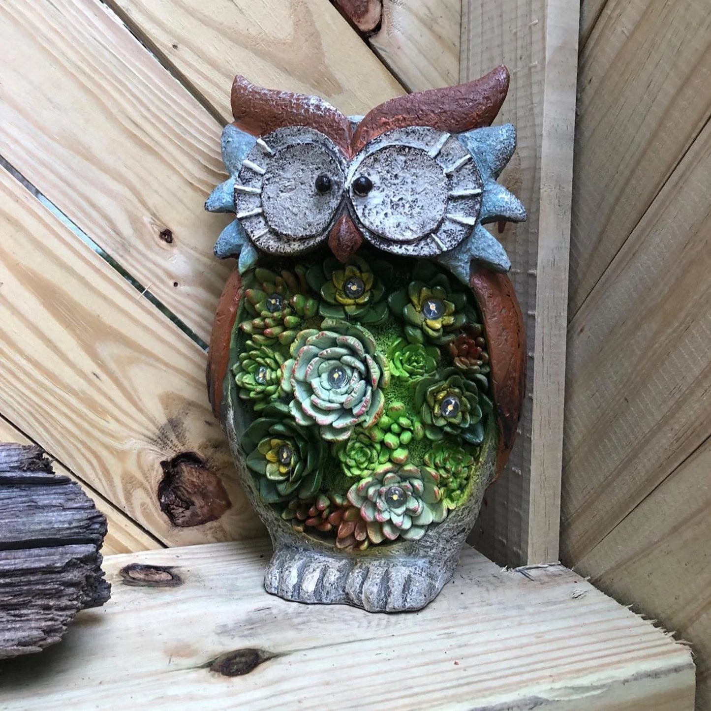 Decorative solar-powered owl-shaped outdoor light for backyard, patio, or garden use