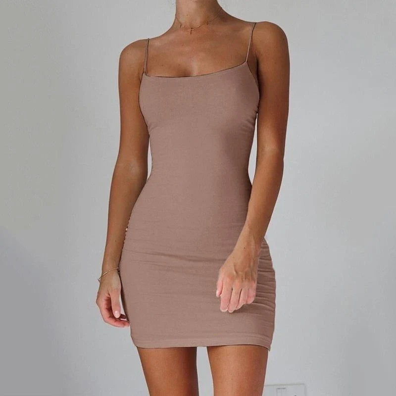 Stylish spaghetti strap mini dress in various colors, showcasing a flattering, form-fitting silhouette for fashionable women