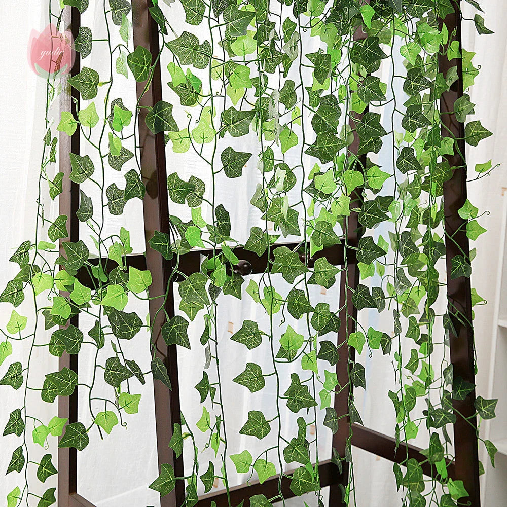 Premium silk hanging leaf garland with realistic green leaves and flexible rattan vine for customizable home, wedding, and garden decor
