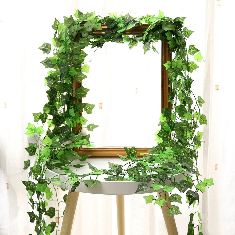 Premium silk hanging leaf garland with realistic green leaves and flexible rattan vine for customizable home, wedding, and garden decor