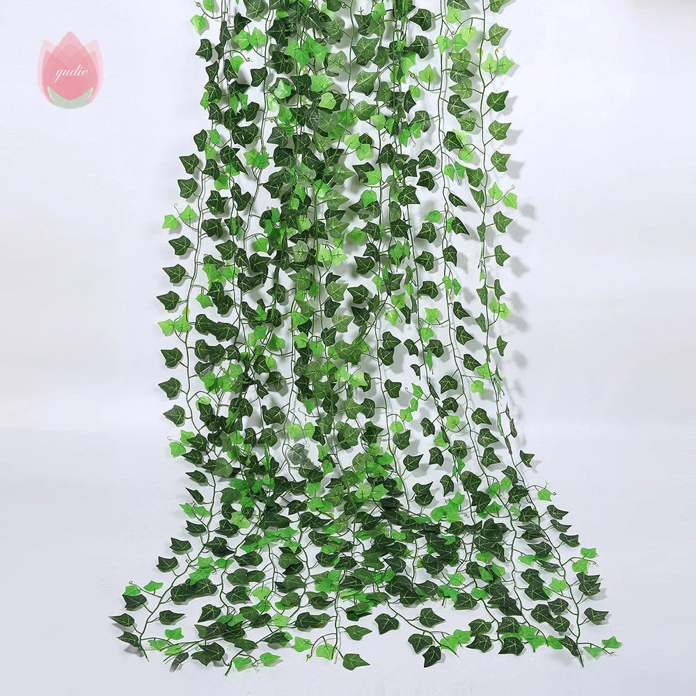 Premium silk hanging leaf garland with realistic green leaves and flexible rattan vine for customizable home, wedding, and garden decor