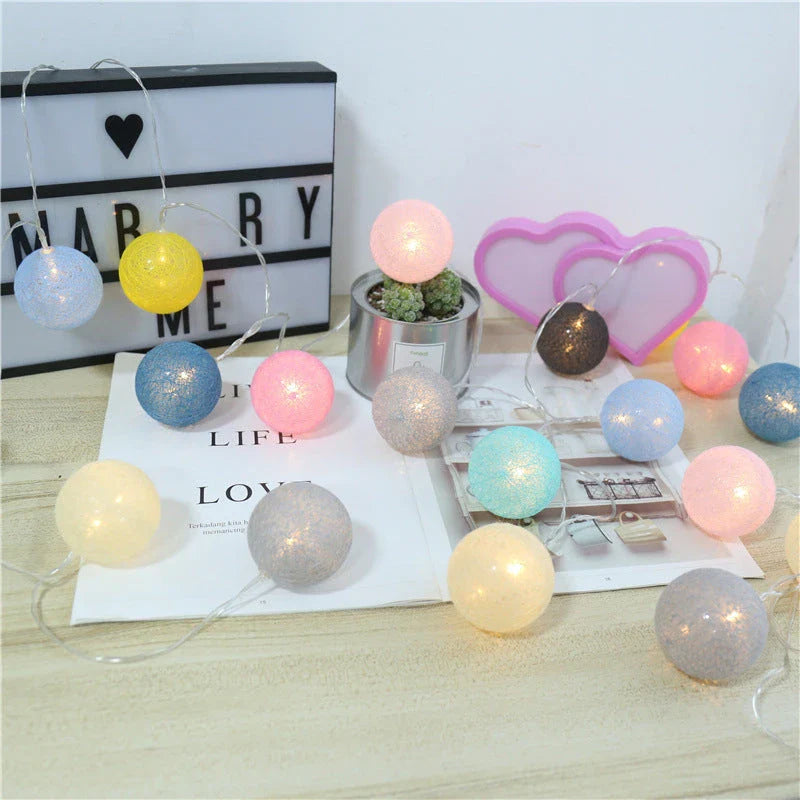 Cosy cotton ball fairy lights with warm, enchanting glow - natural, battery-powered home decor