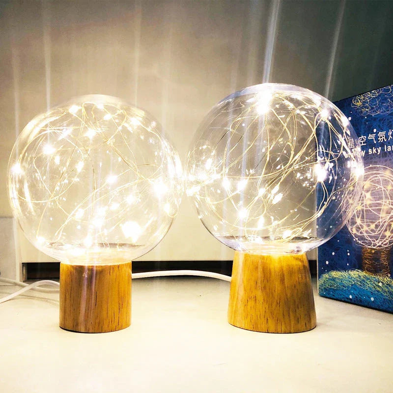 LED Crystal Ball Lamp with warm, magical lighting and elegant wooden base