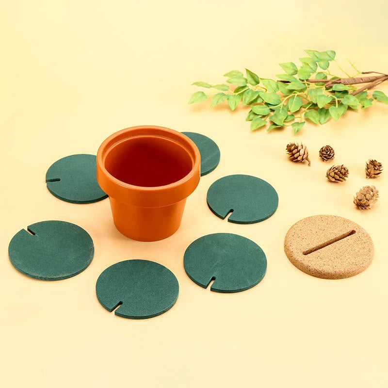 Stylish cactus-shaped coasters in a flowerpot-style holder, protecting a table from hot or cold drinks