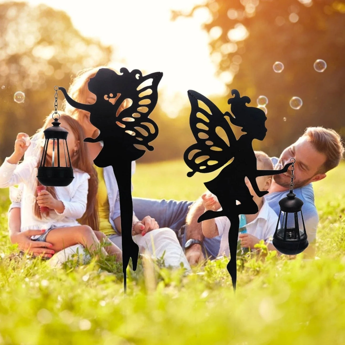 Solar-powered outdoor garden light with wrought-iron fairy lantern design, perfect for illuminating pathways, patios, and landscapes.