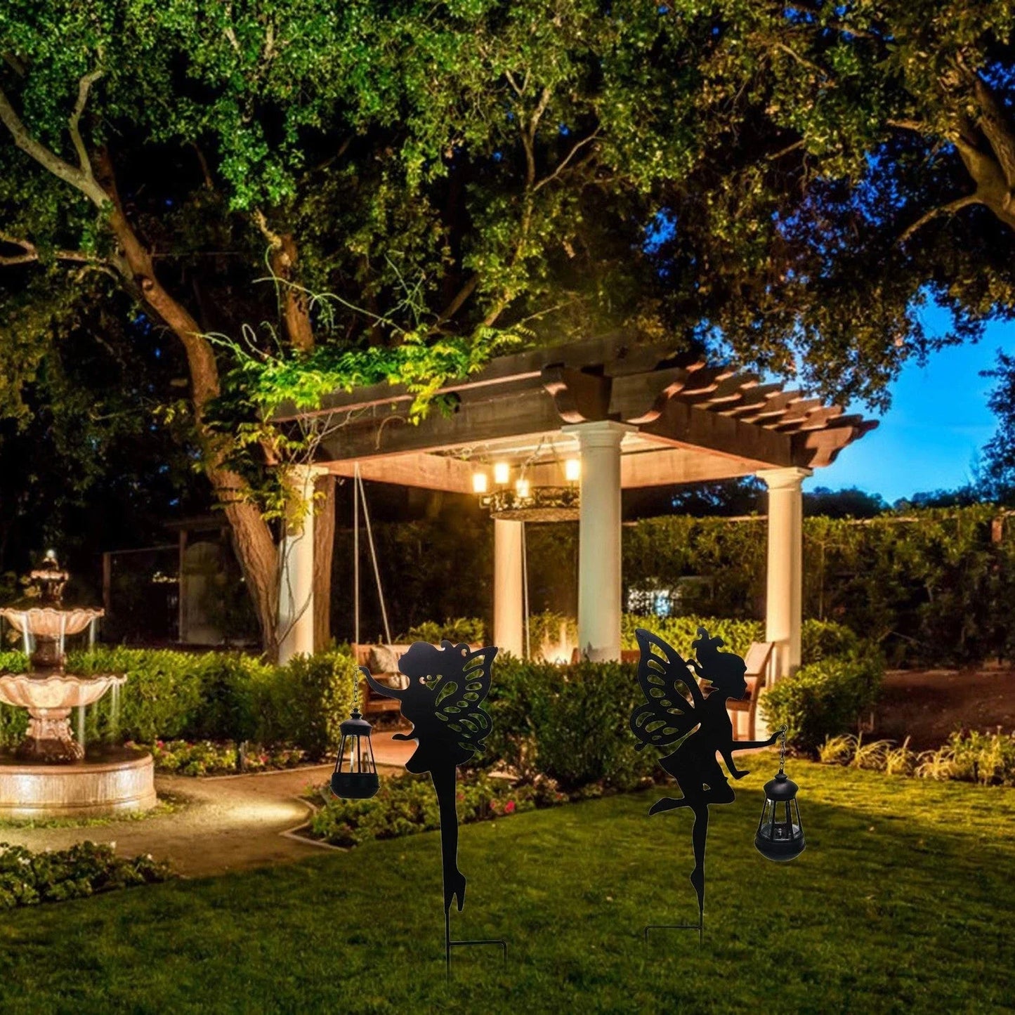 Solar-powered outdoor garden light with wrought-iron fairy lantern design, perfect for illuminating pathways, patios, and landscapes.