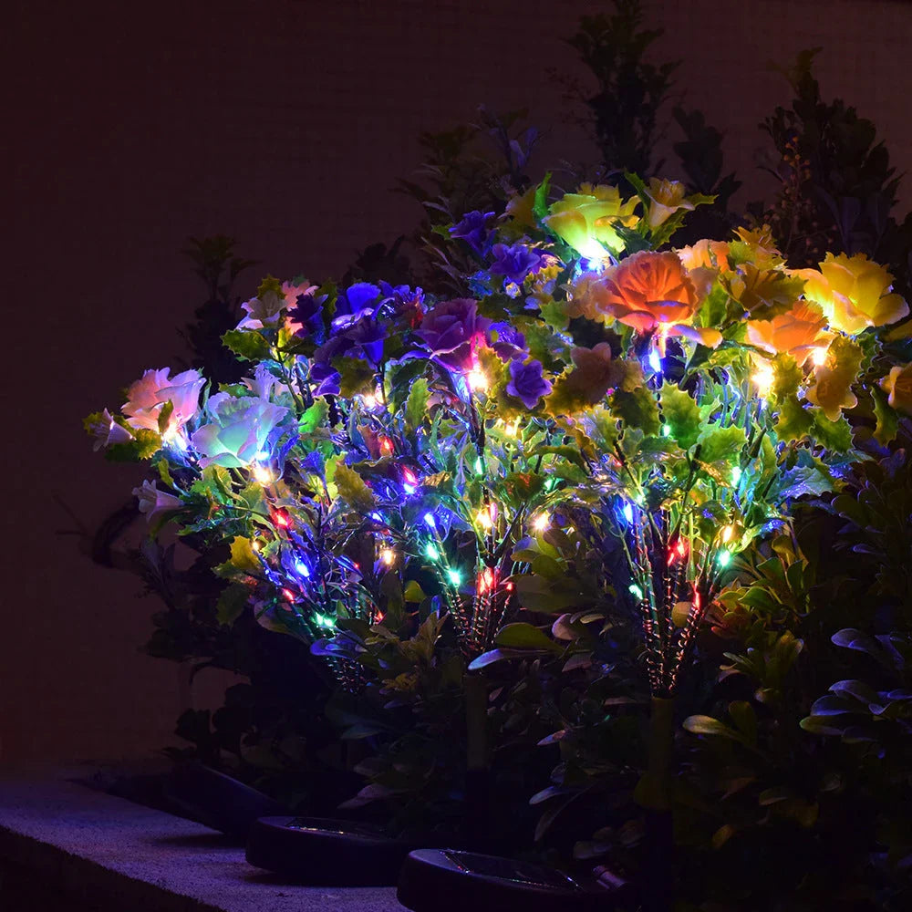 Solar-powered LED garden lights with a decorative flower design for outdoor landscape lighting