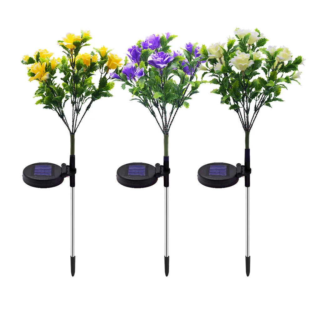 Solar-powered LED garden lights with a decorative flower design for outdoor landscape lighting