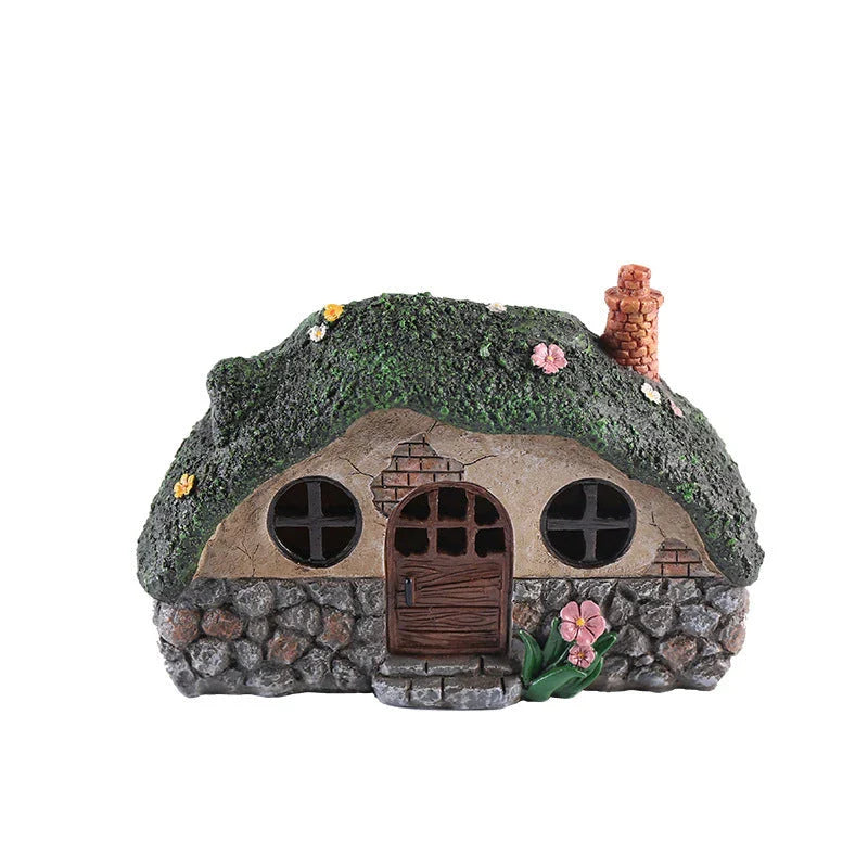 Solar-powered fairy house lamp with warm LED lighting for outdoor garden and patio decor