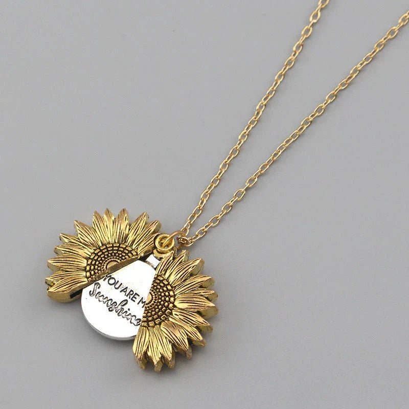 A stunning sunflower pendant necklace with an adjustable chain, crafted from high-quality materials for a radiant and versatile accessory.
