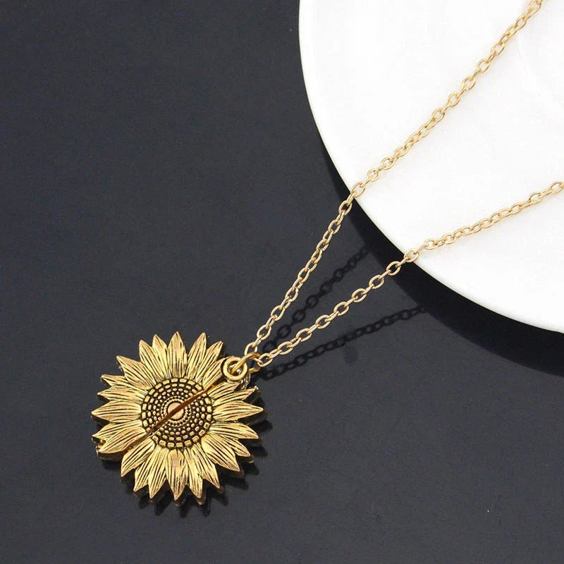 A stunning sunflower pendant necklace with an adjustable chain, crafted from high-quality materials for a radiant and versatile accessory.