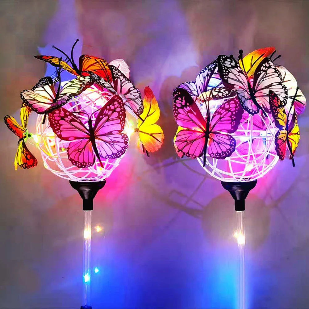Elegant solar-powered butterfly garden lights with sleek black and transparent design, creating a captivating display in an outdoor setting