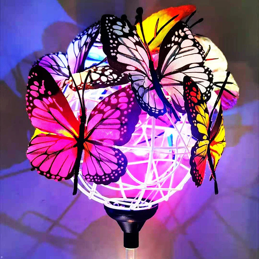 Elegant solar-powered butterfly garden lights with sleek black and transparent design, creating a captivating display in an outdoor setting