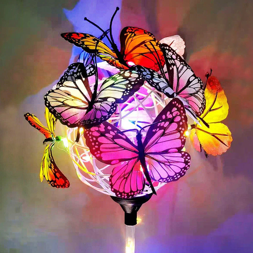 Elegant solar-powered butterfly garden lights with sleek black and transparent design, creating a captivating display in an outdoor setting