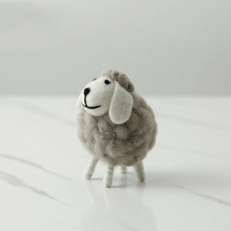 Plush sheep figurines in various colors and sizes, perfect for home decoration and gifting