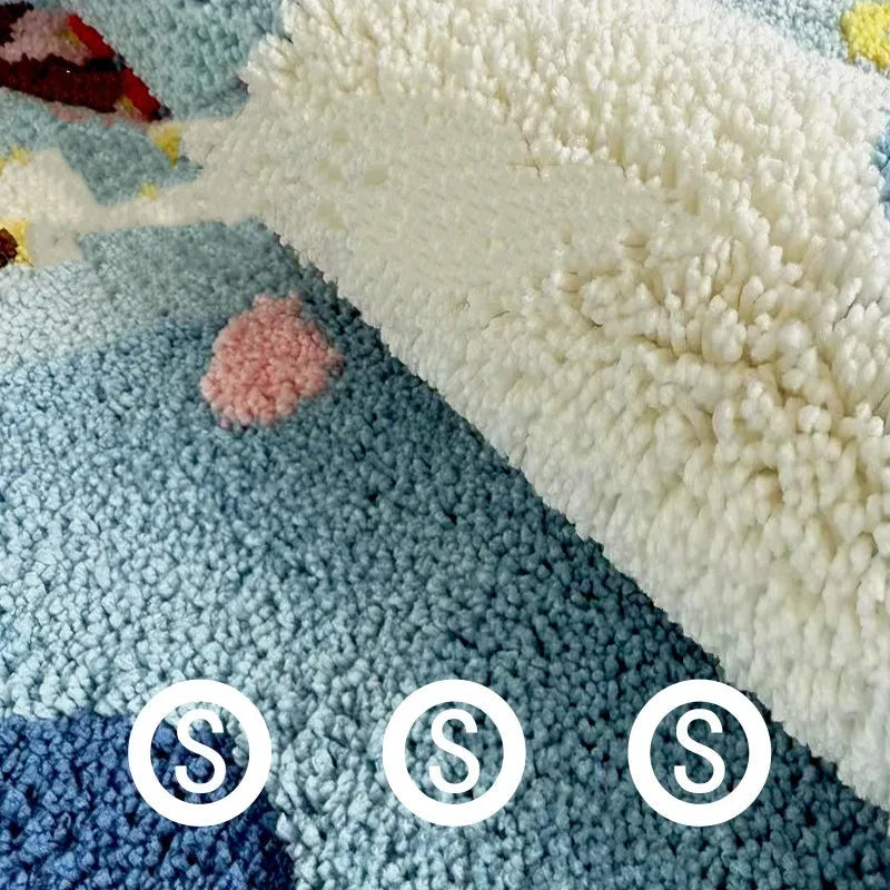 Round blue children's carpet with cartoon snow mountain and Hailang graphic on polyester fabric.