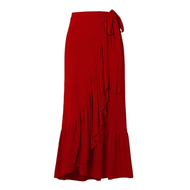 Women's red one-piece nylon swimsuit with matching red skirt laid flat.