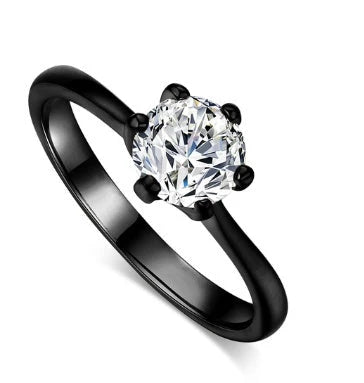 Close-up of a beautiful rose gold ring with sparkling zircon stones