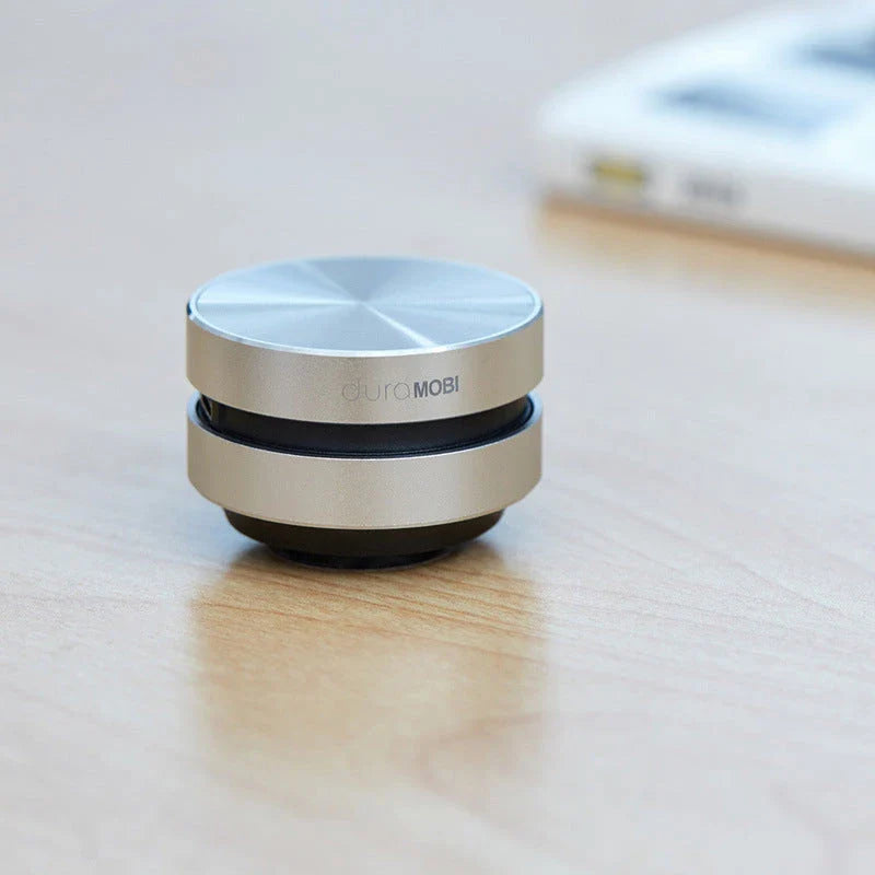Hummingbird Bone Conduction Bluetooth Speaker transforming a hollow surface into a powerful audio system