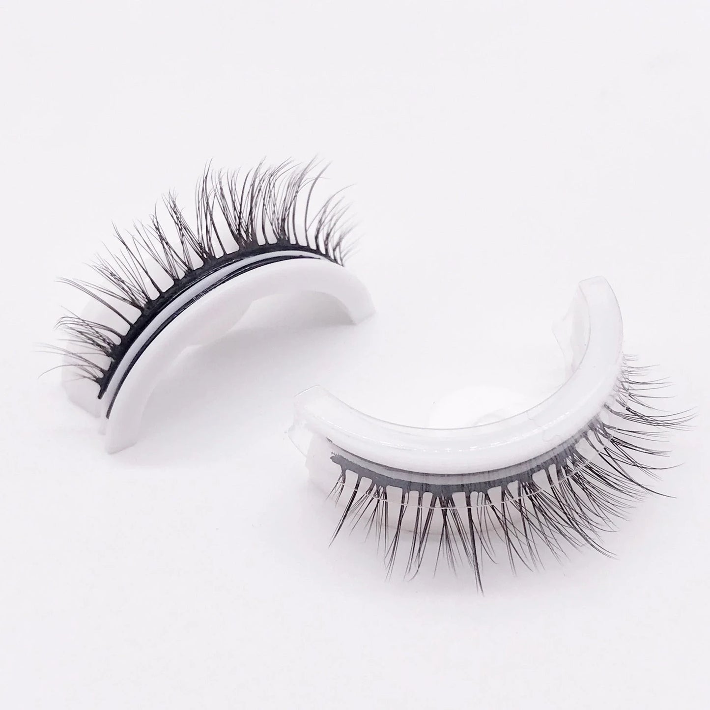 Glamorous 3D mink-inspired false eyelashes in various styles and packaging
