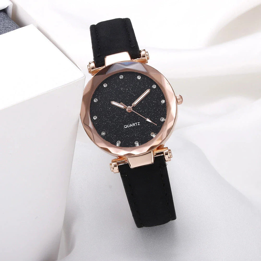 Elegant women's wrist watch with a captivating starry sky dial and leather strap, suitable for any occasion.