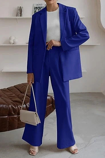 Tailored ladies' suit in various colours, featuring a jacket and trousers made of premium polyester fabric.