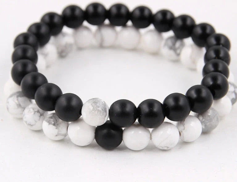 Handcrafted beaded bracelet with seven chakra-representing beads, designed to promote balance and well-being.