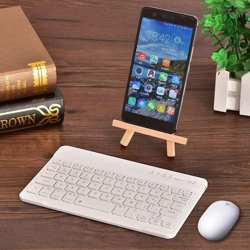 Black or white mini Bluetooth wireless keyboard shown in 7-inch, 9-inch, and 10-inch compact sizes.